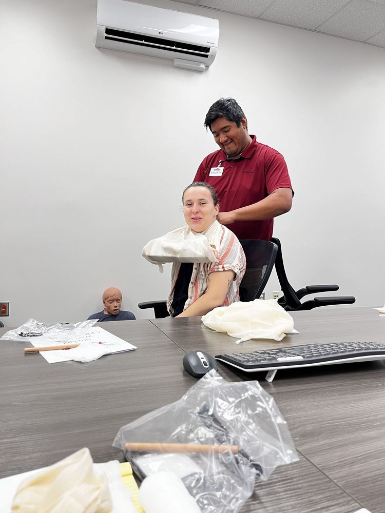 certified instructor showing proper CPR during hands on training for BLS Certification in San Diego.