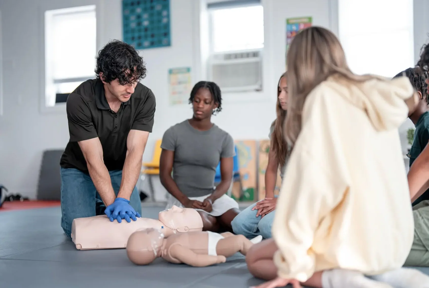 Instructor leading in-person hands on cpr training in san diego